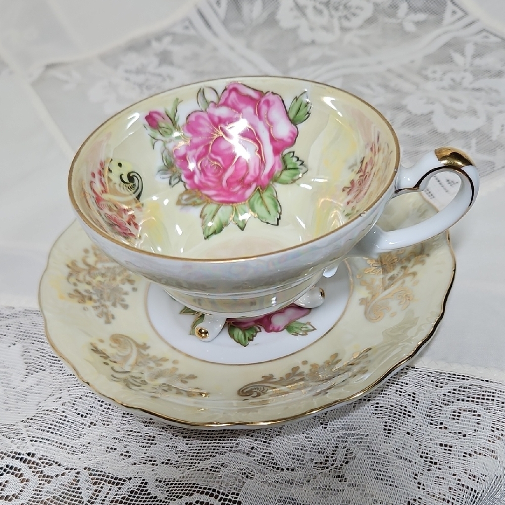 Pink and Gold Tea Set with Floral Design
